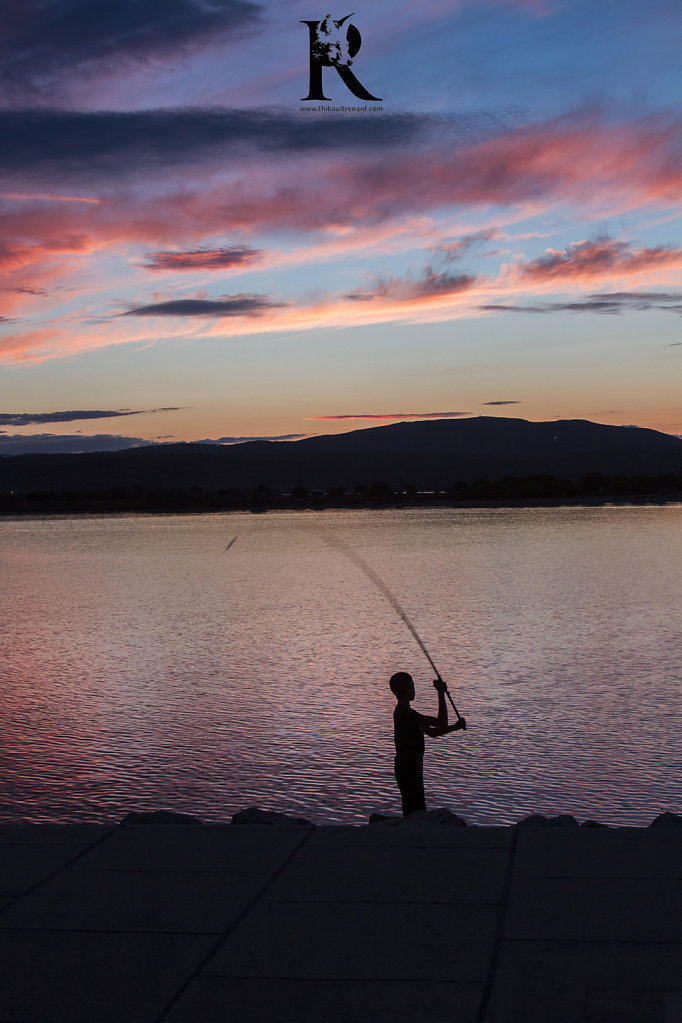 inshore fisherman at sunset, south of France